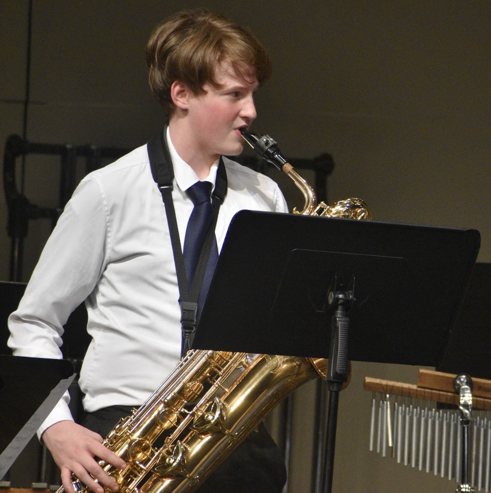 Cameron Losey (10) plays his part during the spring concert. 